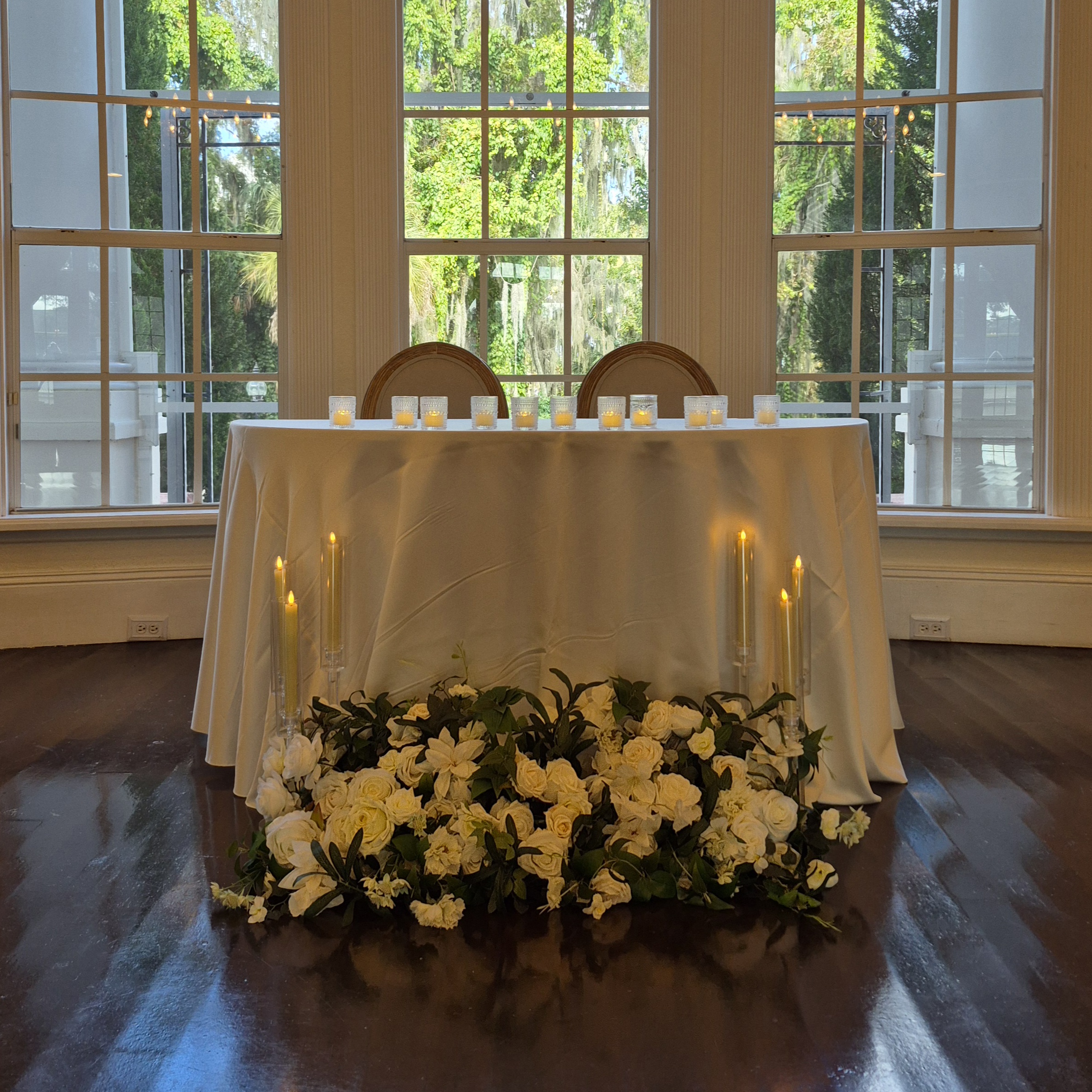 #AA0022 - White Rose Greenery Florals, 6 Tall Clear Candles, $65.00 White Rose Greenery Florals, 6 Tall Clear Candles