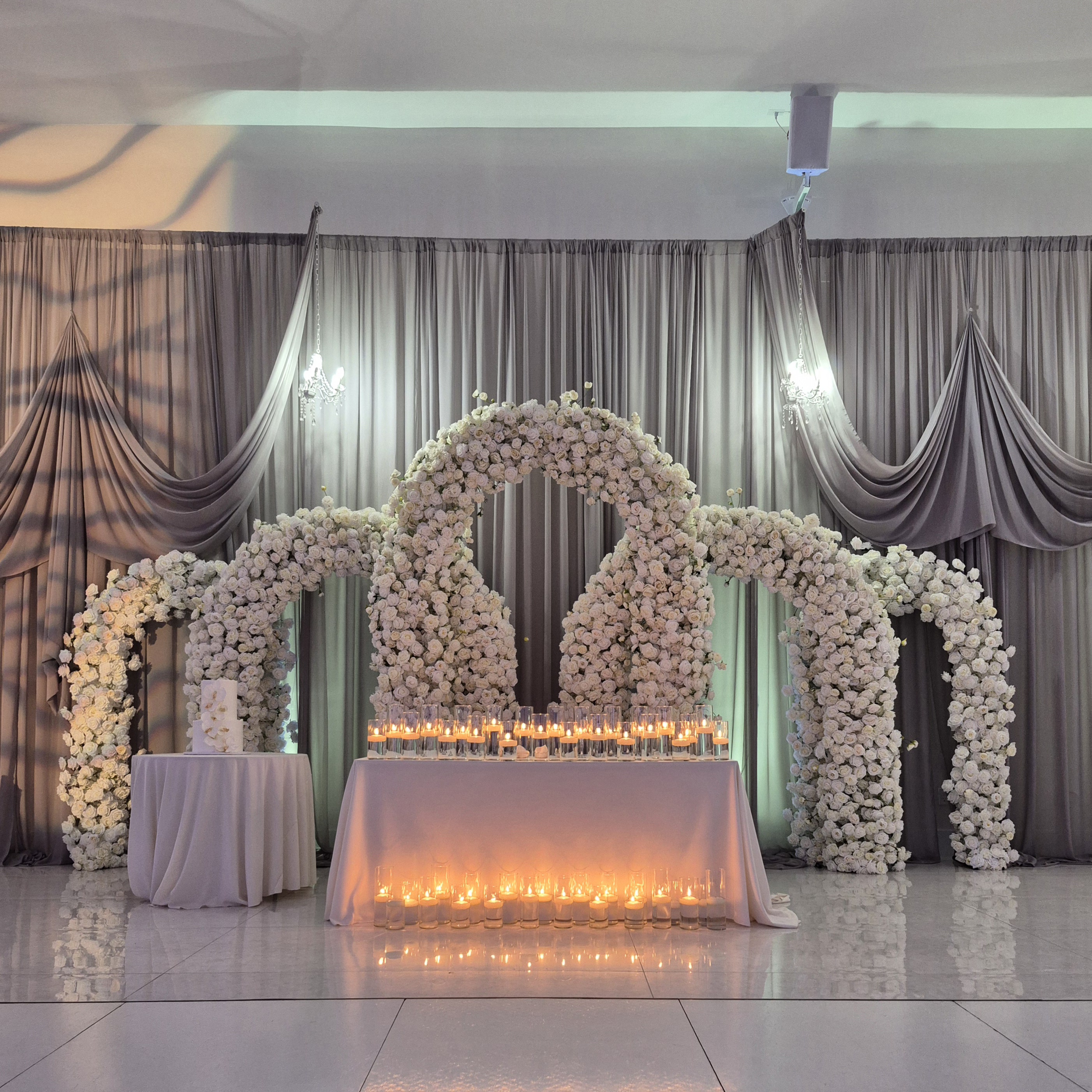 #AA0007 - 5 White Ivory Rose Arches & 48 Hurricane Candles, $1 220.00 5 White Ivory Rose Arches & 48 Hurricane Candles